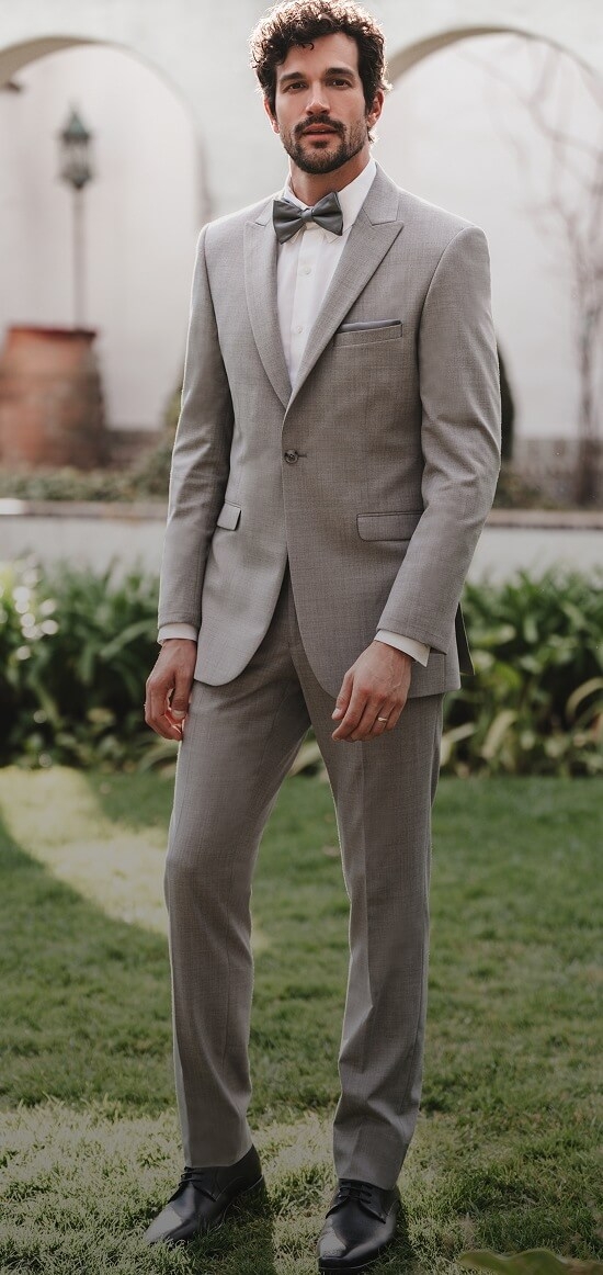 Model wearing a Menswear suit